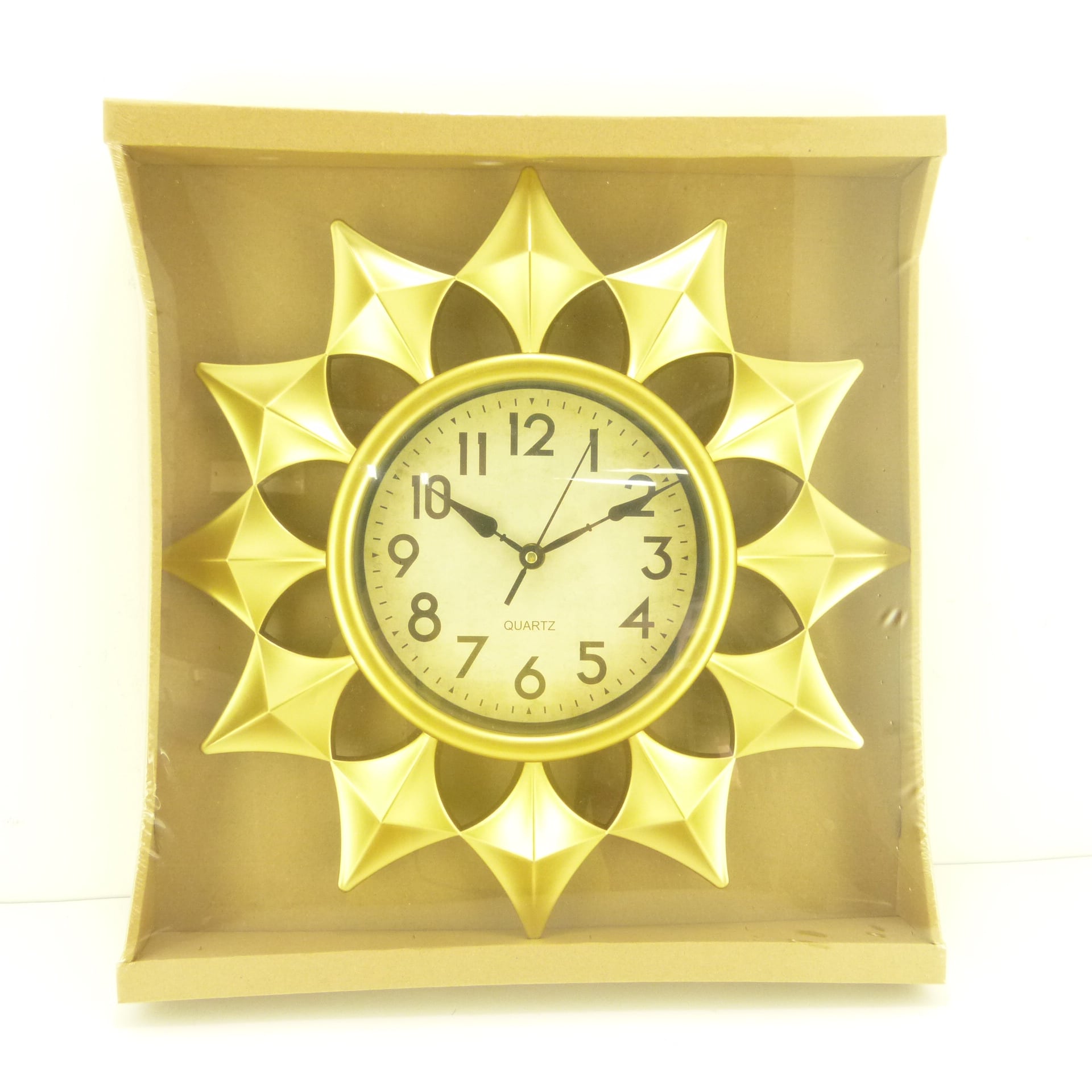 Reloj de pared dorado marco sol